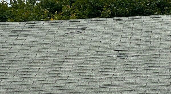 Damaged roof ready for repair